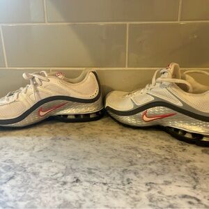 Nike (women’s)  White and Black Sneakers with Pink Accents